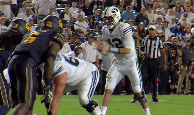 BYU quarterback Tanner Mangum awaits a snap in the Cougars' 21-18 loss to Cal....
