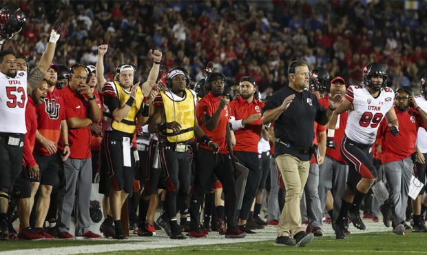 The Utah bench celebrates a Ute touchdown during the University of Utah versus UCLA football game a...