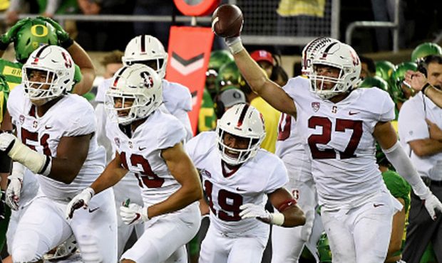 Linebacker Sean Barton (27) of the Stanford Cardinal runs off the field with a fumble recovery in t...