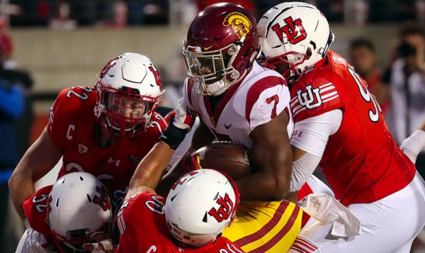 USC Trojans running back Stephen Carr is brought down by a gang of Utes during NCAA football in Sal...