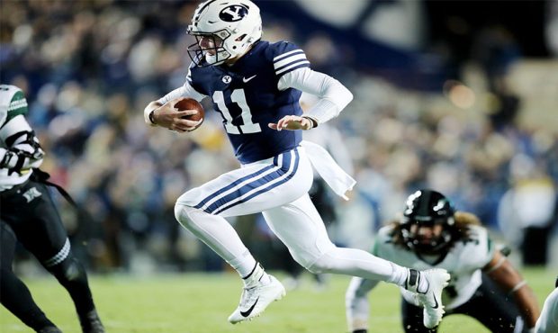 Brigham Young Cougars quarterback Zach Wilson (11) breaks away and runs for a touchdown as BYU and ...