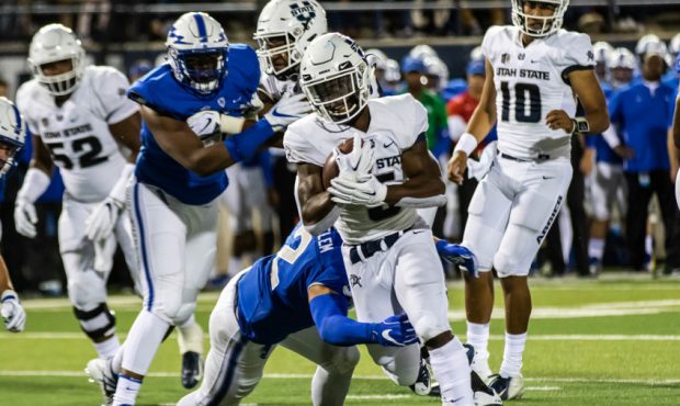 Utah State running back Darwin Thompson heads for the end zone last Saturday night against Air Forc...