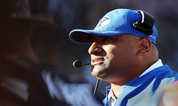 Brigham Young Cougars head coach Kalani Sitake watches as his team is down one point in the fourth ...