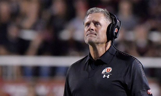 Head coach Kyle Whittingham of the Utah Utes looks at a replay in the first half of a game against ...