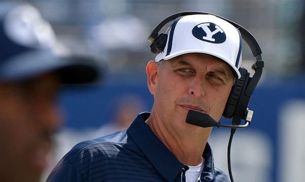 Offensive coordinator Ty Detmer of the BYU Cougars looks on from the sideline during the Cougars ga...