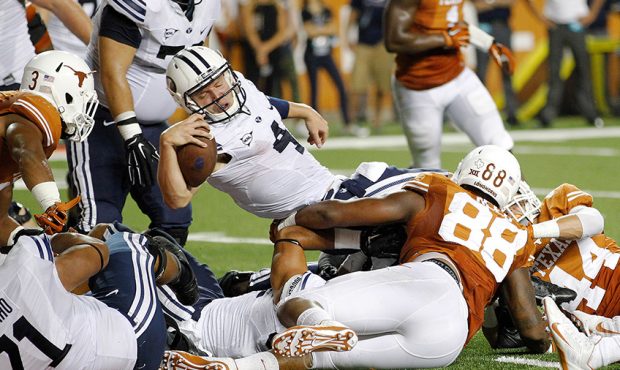 AUSTIN, TX - SEPTEMBER 6: Taysom Hill #4 of the BYU Cougars reaches the end zone to score his secon...