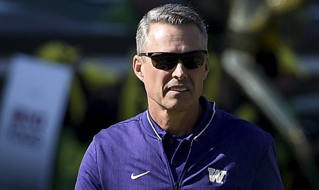 EUGENE, OR - OCTOBER 13: Head coach Chris Petersen walks on the field before the game against the O...