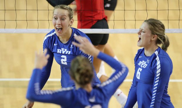 BYU's Heather Gneiting (2) and BYU's Lyndie Haddock-Eppich celebrate a point against Utah in Provo ...