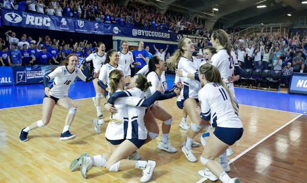 BYU celebrates match point over Texas. The BYU Women's Volleyball team defeated Texas 3-0 in the Re...