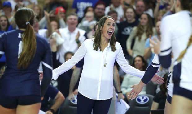 BYU Head Coach Heather Olmstead celebrates during a timeout in the 3rd set. The #4 BYU Women's Voll...