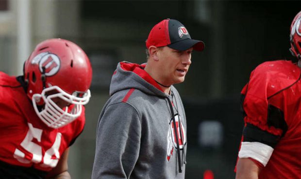 Jim Harding directs during warmup for a University of Utah Football scrimmage in Salt Lake City, Fr...