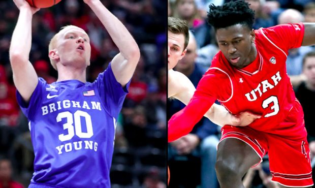 Brigham Young Cougars guard TJ Haws (Left) and Utah Utes forward Donnie Tillman (Right) during the ...