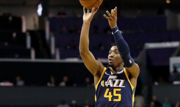 Donovan Mitchell #45 of the Utah Jazz shoots the ball against the Charlotte Hornets during their ga...