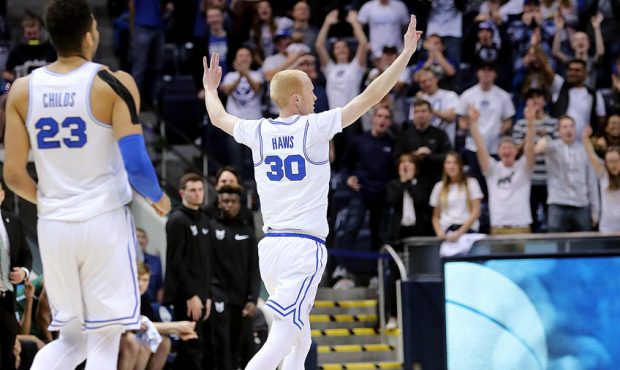Brigham Young Cougars guard TJ Haws (30) celebrates another three point shot as BYU and Portland St...
