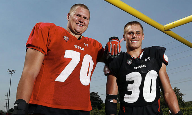 University of Utah football players Jackson Barton, left, and his brother Cody pose for a photo in ...