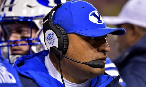 Head coach Kalani Sitake of the Brigham Young Cougars looks on in a game against the Utah Utes at R...