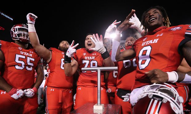 Utah players light the U as they defeat BYU at Rice Eccles Stadium in Salt Lake City on Sunday, Nov...