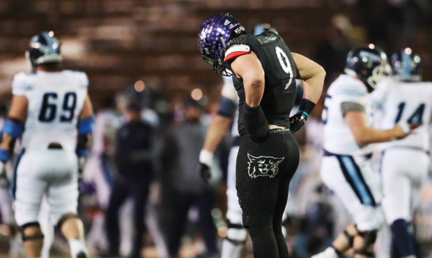 Weber State Wildcats defensive end Adam Rodriguez (9) hangs his head after a Maine big play as Webe...
