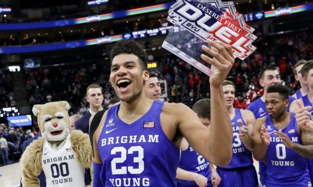 Brigham Young Cougars forward Yoeli Childs (23) celebrates with his team after winning over the Uta...