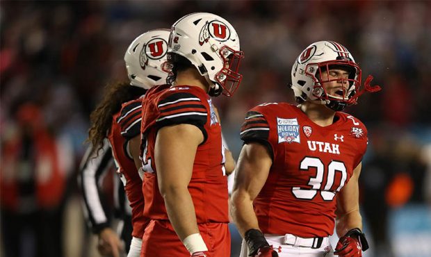 Cody Barton #30 of the Utah Utes reacts turnover a tackle against the Northwestern Wildcats during ...