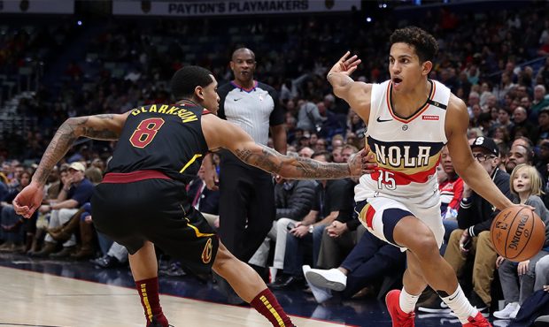 Frank Jackson #15 of the New Orleans Pelicans drives the ball around Jordan Clarkson #8 of the Clev...