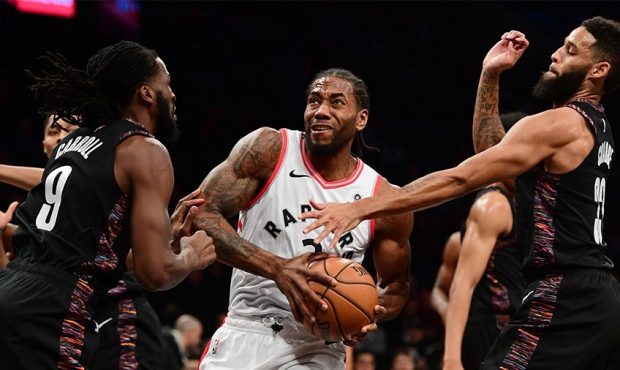 Kawhi Leonard #2 of the Toronto Raptors drives toward the basket during the game against Brooklyn N...