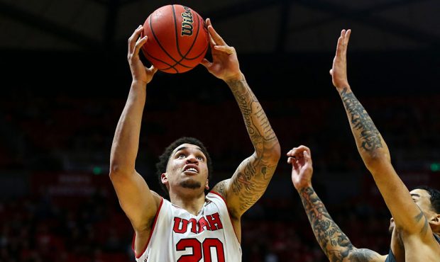 Utah Utes forward Timmy Allen (20) takes a jump shot against the Washington State Cougars during th...