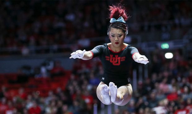 Utah's Kari Lee competes on the uneven bars during a meet with Arizona State at the Huntsman Center...