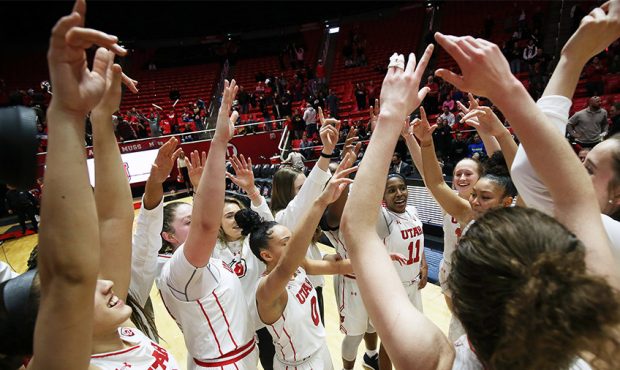 Utah Utes celebrate their victory over the Stanford Cardinal in Salt Lake City on Sunday, Jan. 27, ...