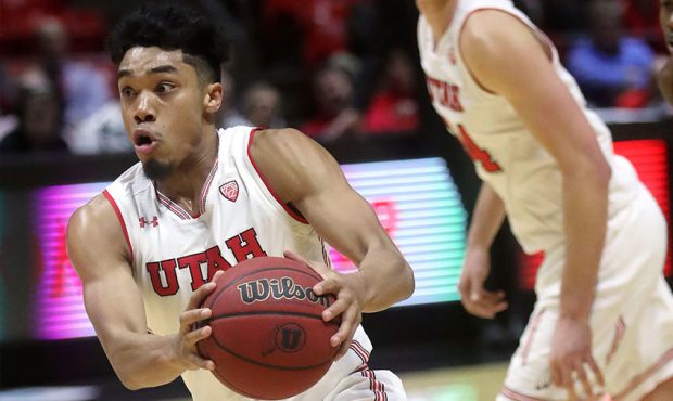 Utah Utes guard Sedrick Barefield (2) moves with the ball during a basketball game against the Flor...