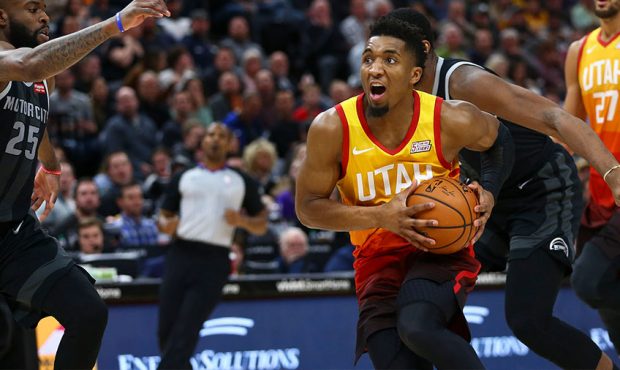 Utah Jazz guard Donovan Mitchell (45) prepares to jump for a layup against the Detroit Pistons duri...