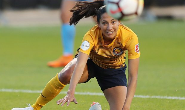 Utah Royals' Christen Press competes for the ball against FC Sky Blue in Sandy on Saturday, June 30...