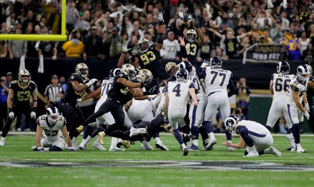Johnny Hekker #6 and Greg Zuerlein #4 of the Los Angeles Rams celebrate after kicking the game winn...
