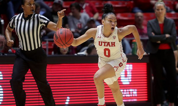 Utah Utes guard Kiana Moore (0) looks for a teammate after stealing the ball as Utah and Colorado p...