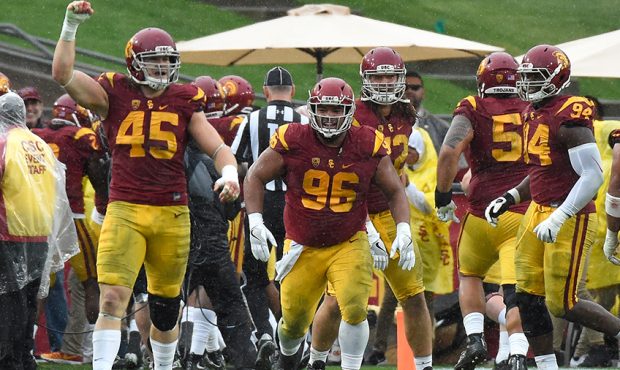 The USC Trojans celebrate after scoring a touchdown in the second quarter against the Notre Dame Fi...