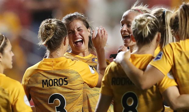 Utah Royals FC forward Katie Stengel (24) celebrates after the match with teammates as the Utah Roy...