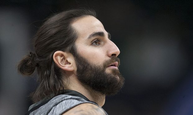 Ricky Rubio #3 of the Utah Jazz watches a shot during warm ups before their game against the Portla...