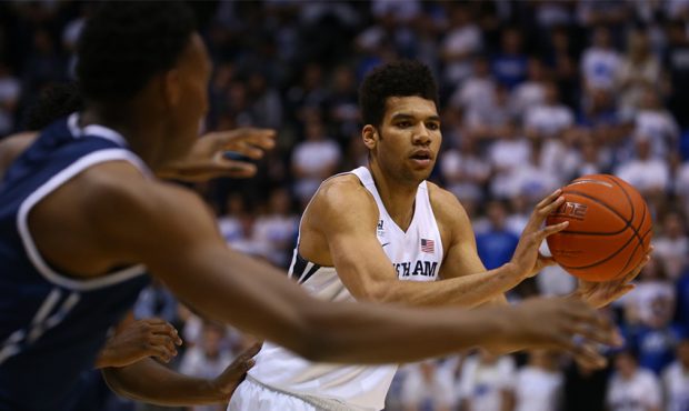 Brigham Young Cougars forward Yoeli Childs (23) passes the ball against the Loyola Marymount Lions ...