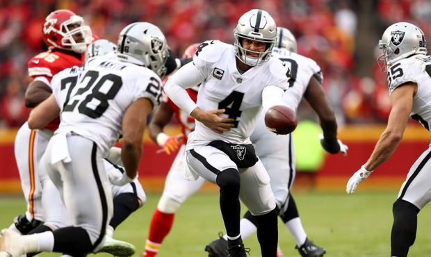 Quarterback Derek Carr #4 of the Oakland Raiders in action during the game against the Kansas City ...