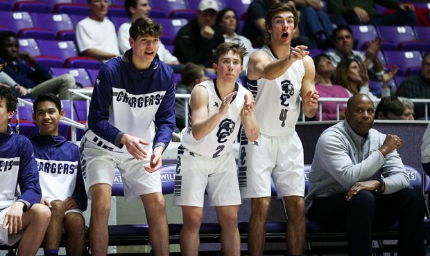 The Corner Canyon Chargers reacts to their teammate scoring on the Highland Rams during the 5A boys...