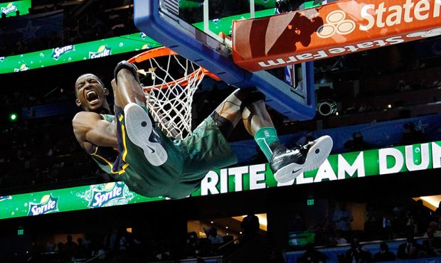 Jeremy Evans of the Utah Jazz reacts after he dunks during the Sprite Slam Dunk Contest part of 201...