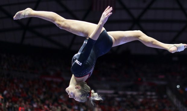 Utah's Makenna Merrell-Giles competes on the beam during a gymnastics meet against Georgia at the H...