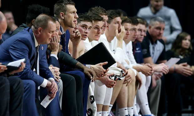 BYU's bench watches as BYU Cougars and San Diego Toreros play in WCC tournament action at the Orlea...