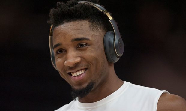 Donovan Mitchell #45 of the Utah Jazz smiles after making a shot during a pregame shoot around befo...