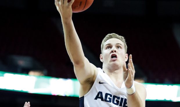Utah State Aggies guard Sam Merrill (5) goes to the hoop during a Mountain West Conference semifina...