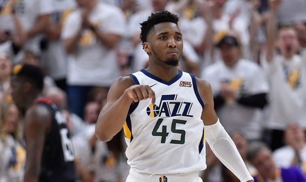 Donovan Mitchell #45 of the Utah Jazz reacts to his three point basket in the second half of Game F...