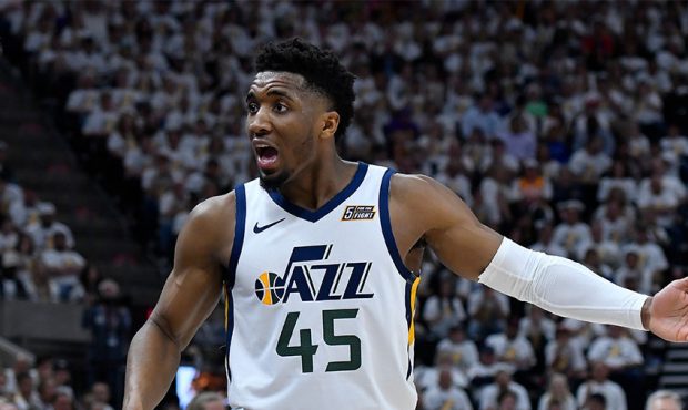 Utah Jazz head coach Quin Synder and Donovan Mitchell #45 of the Utah Jazz interact in the second h...