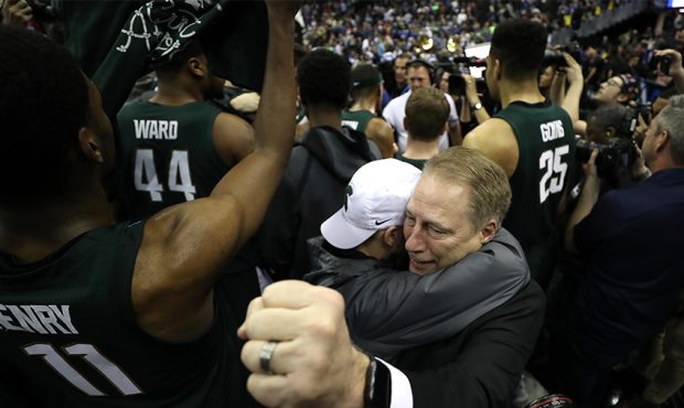 Head coach Tom Izzo of the Michigan State Spartans celebrates after defeating the Duke Blue Devils ...