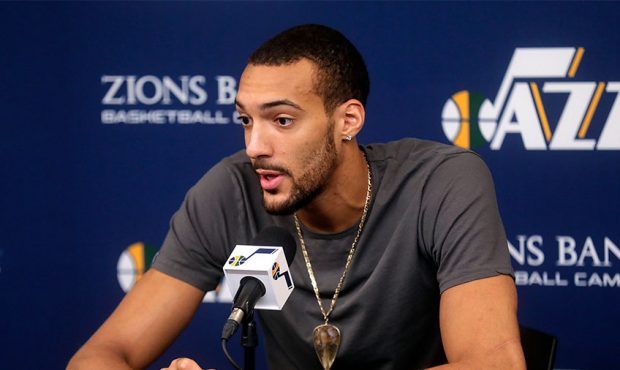 Utah Jazz center Rudy Gobert talks to members of the media at the Zions Bank Basketball Center in S...