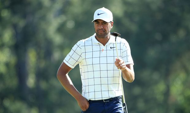 Tony Finau of the United States reacts on the 18th green during the third round of the Masters at A...